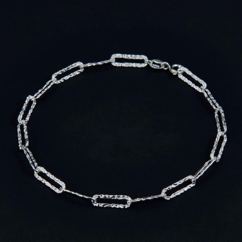 Glistening Embossed Cross-Chain Bright Silver Bracelet - CARA